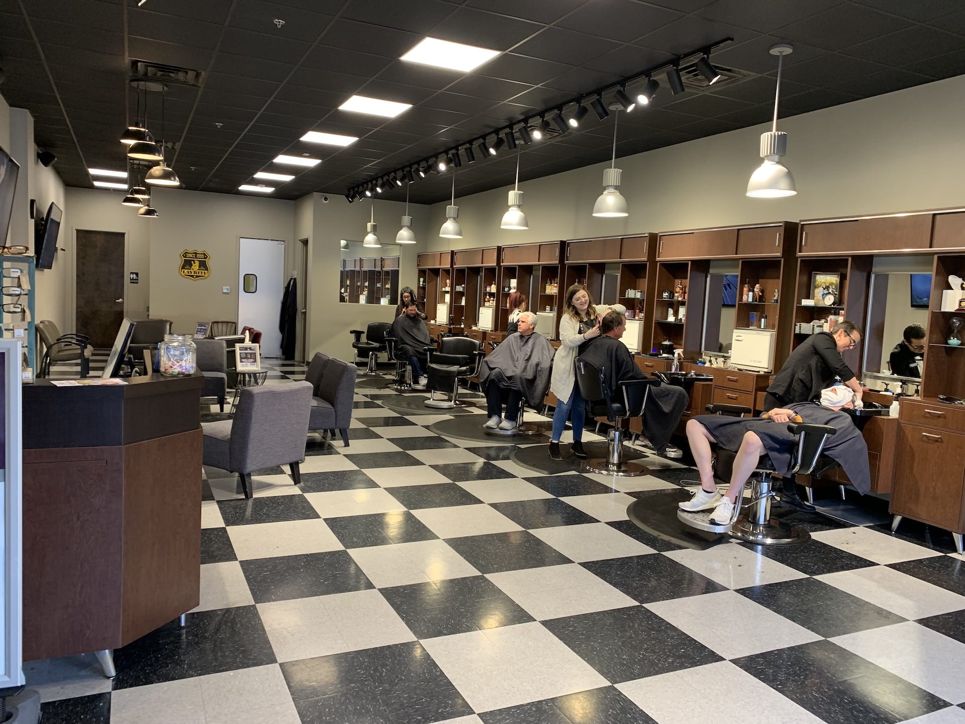 Uncle's Spring Hill barbers at work