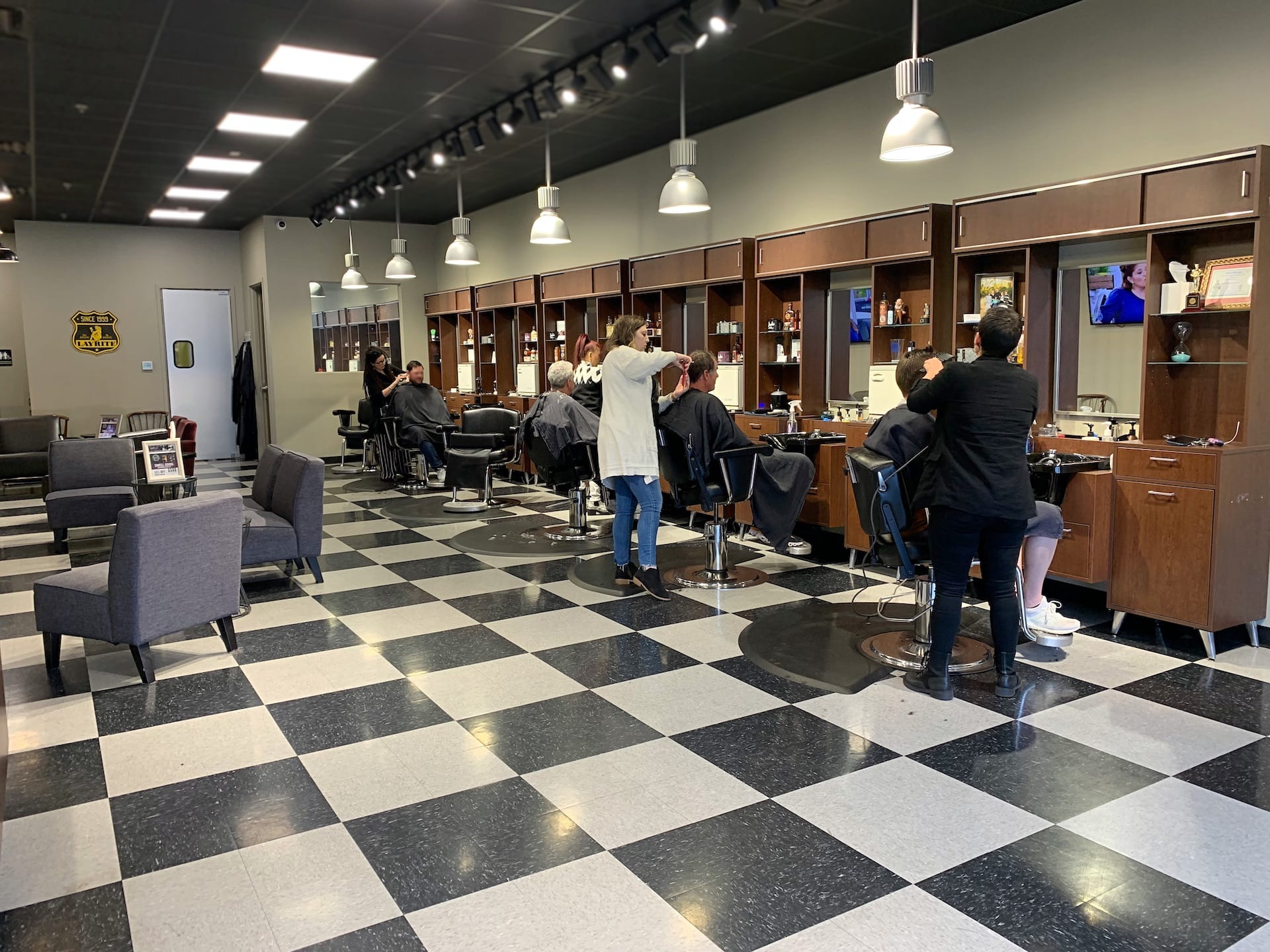 Spring Hill, TN barbers inside a barbershop